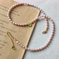 Collana perle rosa e peridoto