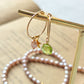 Orecchini perla rosa e peridoto